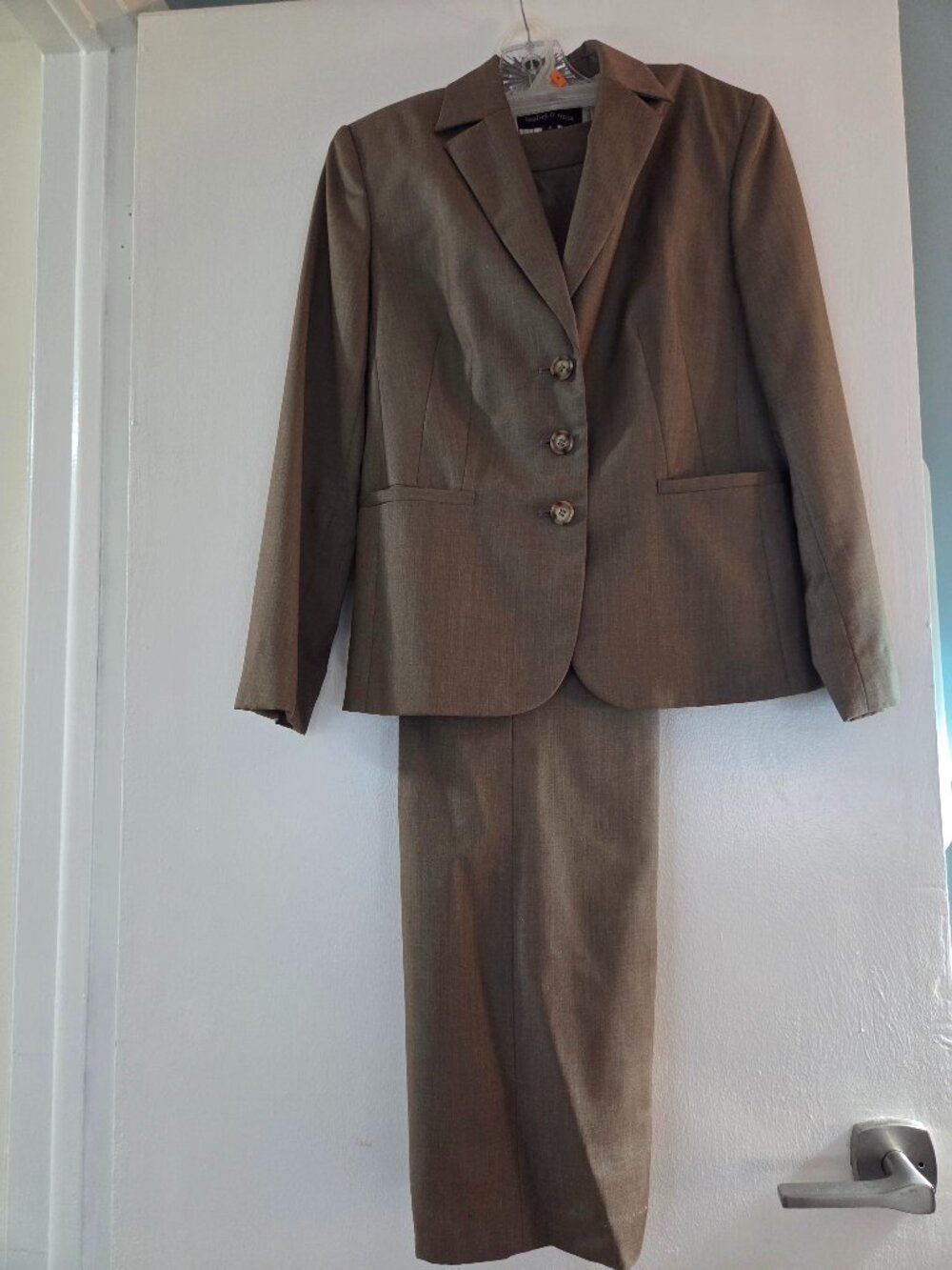 Gently and barely worn size 6 olive green suit.